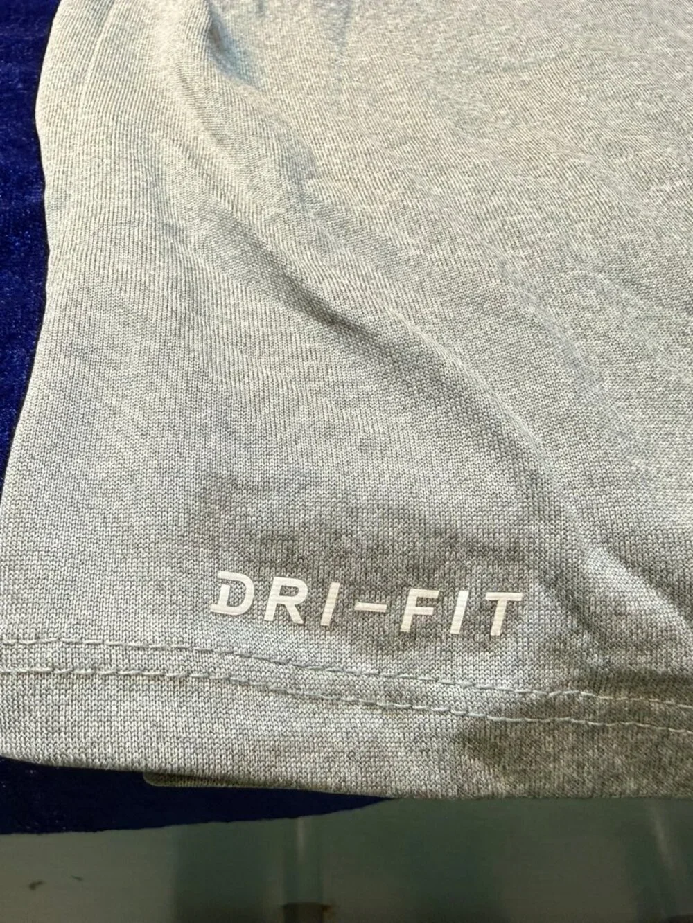 Girl's Nike Dri-Fit Gray Shirt with Pink Hint Swoosh